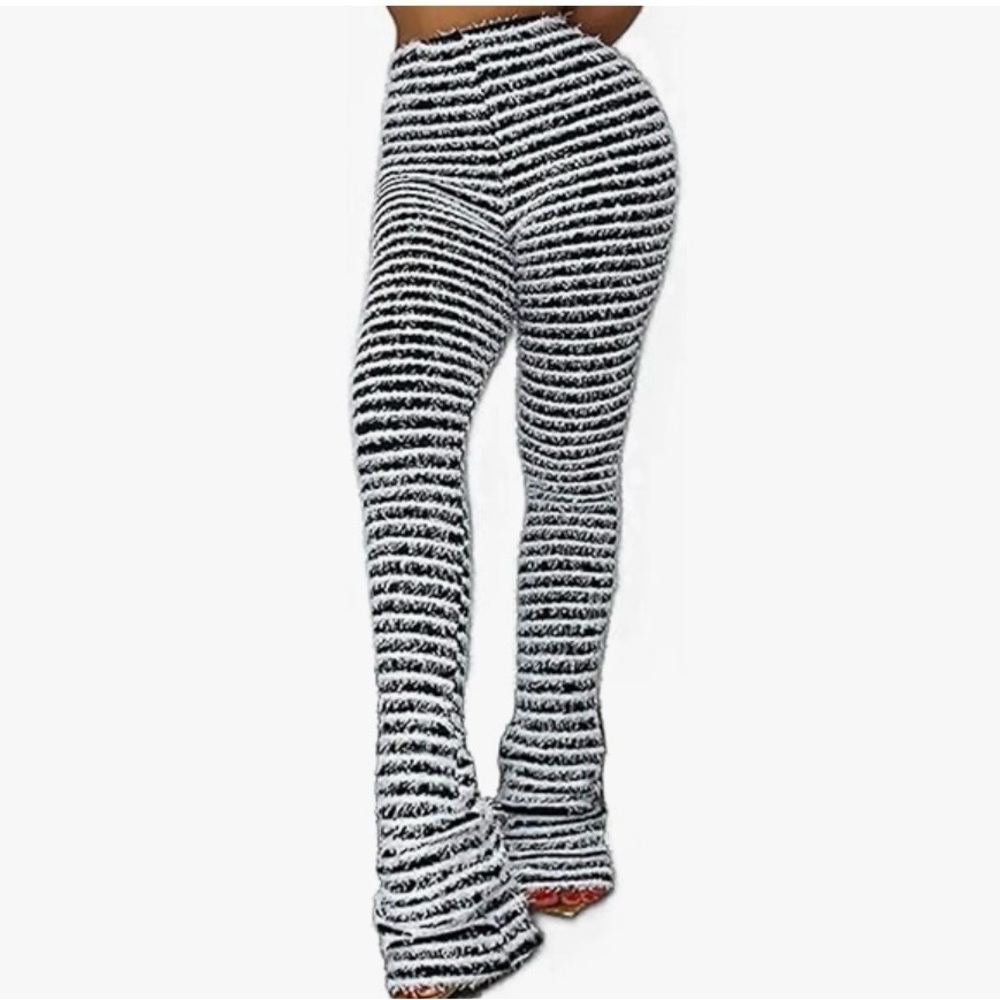 Black and White Flare Jeans with Bold Stripes stacked leggings